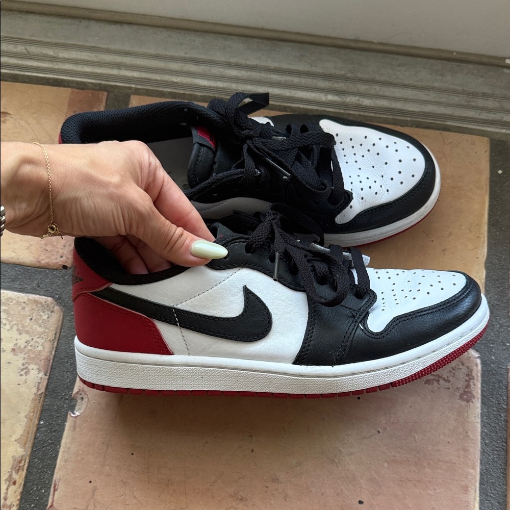Nike Men’s Black, White, Red Low-Top Jordans